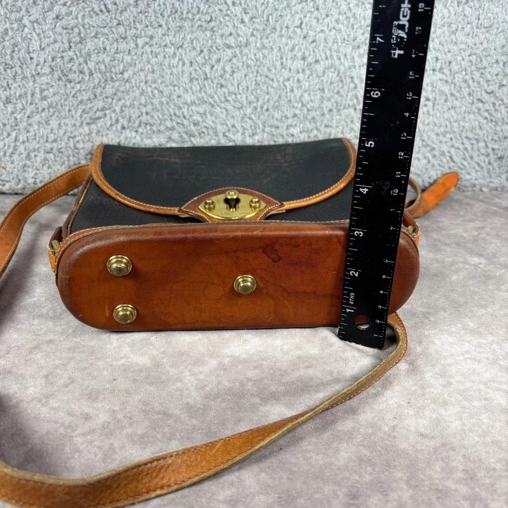 Dooney & Bourke Crossbody Bag Womens Medium Black Tan All Weather Leather Toggle